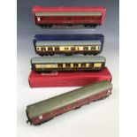 Three boxed Hornby Dublo electric OO gauge model railway carriages including a D20 composite