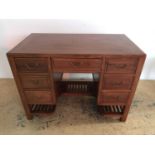 A quality late 20th Century Chinese hardwood kneehole desk