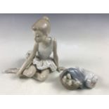 A Nao figurine of a ballet dancer together with a Lladro group of ducks