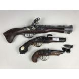 Three replica antique guns