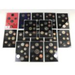 Fifteen Royal Mint proof coin year sets in Perspex cases, 1981-1990, 1992-1996