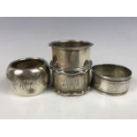 Four silver napkin rings