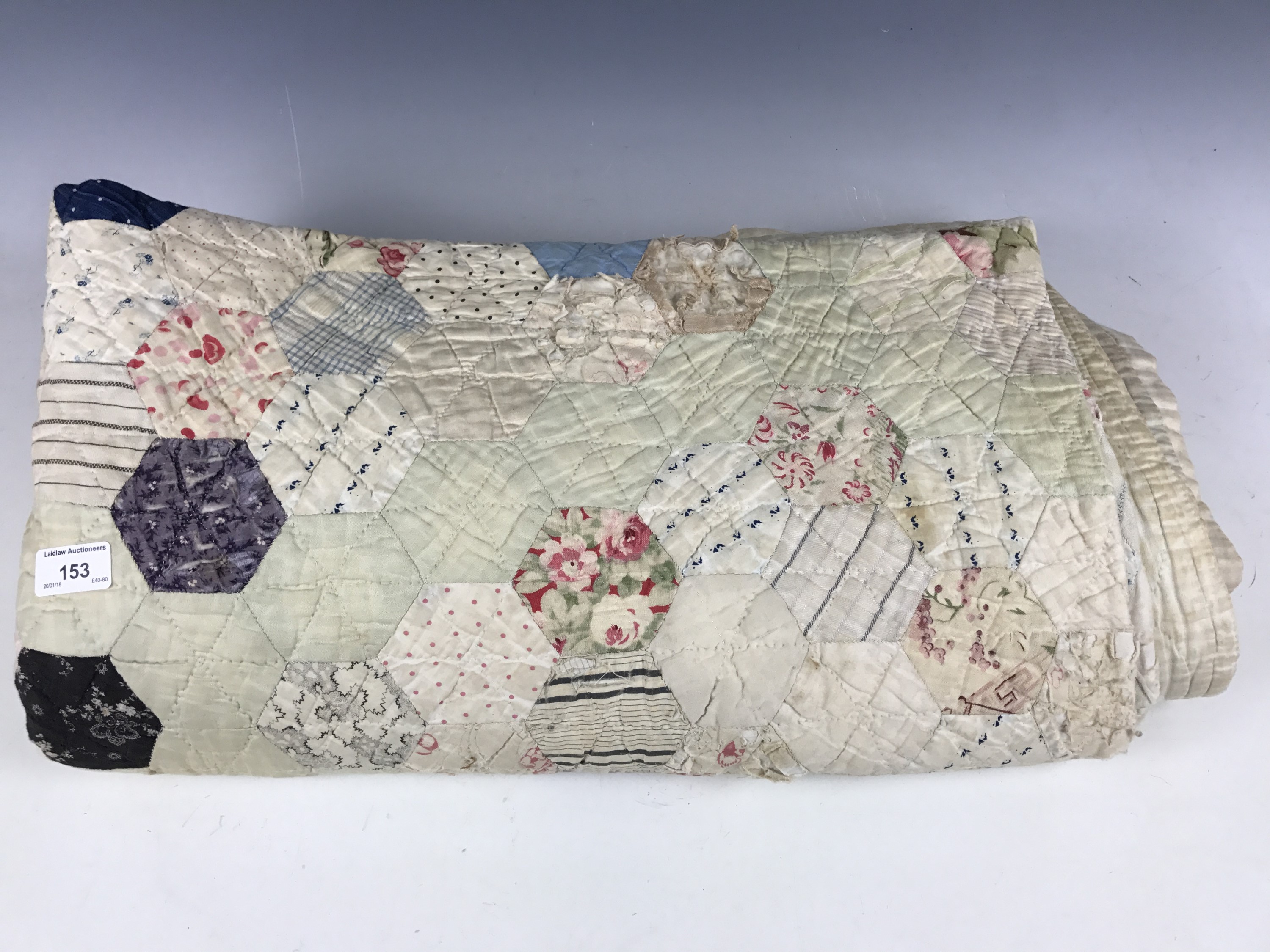 A Victorian patchwork quilt, 225 x 210 cm (a/f)