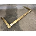 A brass kerb, 103 x 46 cm