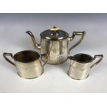 A three-piece electroplate tea set