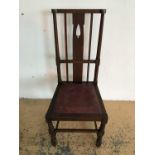 An oak Arts and Crafts style kitchen chair