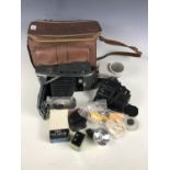 A Polaroid Model 160 land camera with accessories, together with a Chinon Genesis