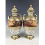 A pair of hand enamelled Noritake vases (both lids a/f)