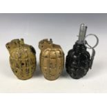 An inert Russian hand grenade together with two Mills bomb castings