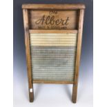 A vintage The Albert Scotland wooden wash board