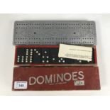 Vintage dominoes and a whist marker