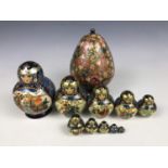 A set of Russian Maruska dolls together with an egg-form lacquered box