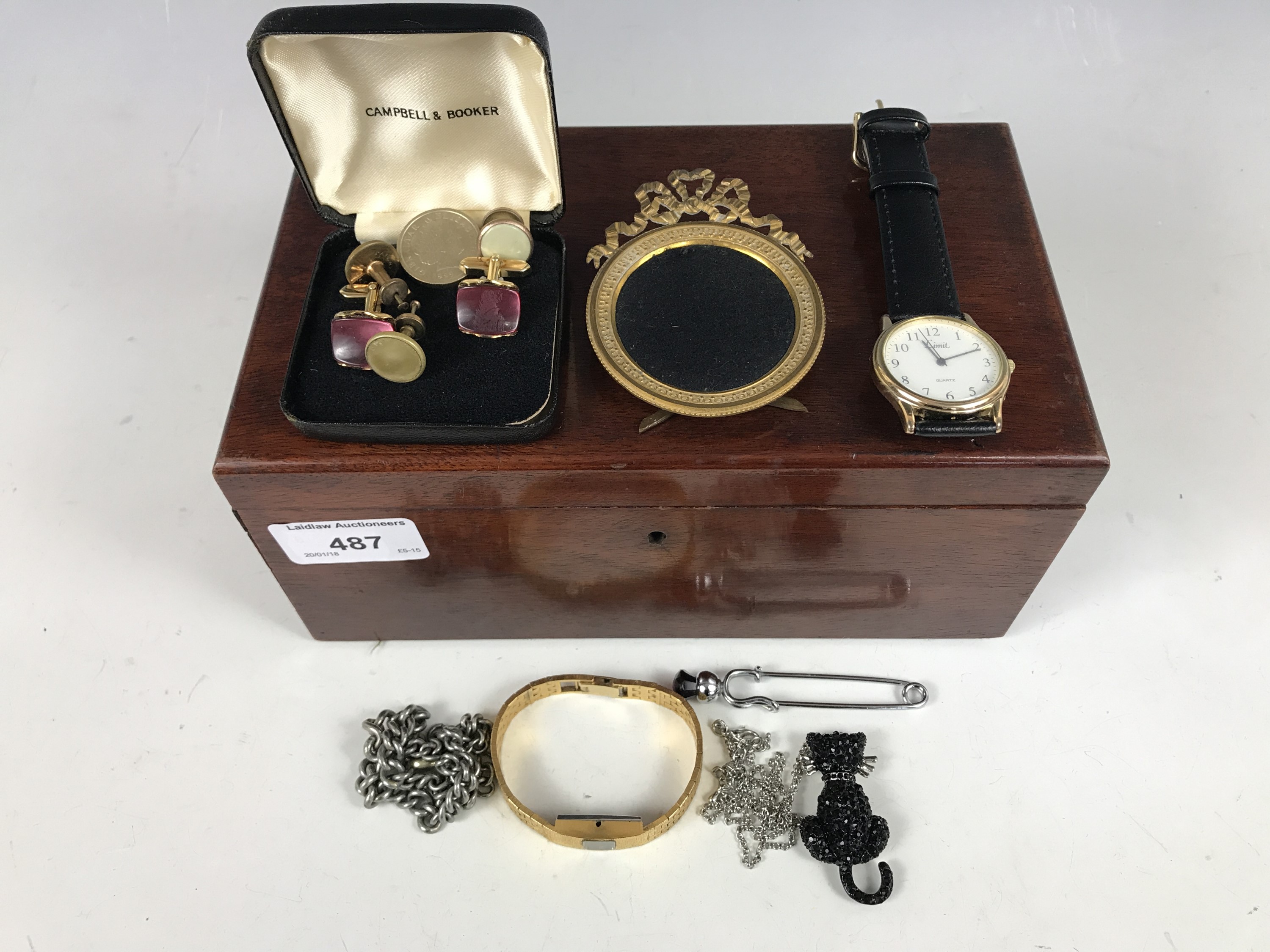 A mahogany box containing sundry vintage jewellery and watches, including a Victorian white metal