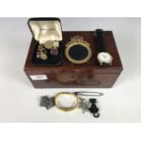 A mahogany box containing sundry vintage jewellery and watches, including a Victorian white metal