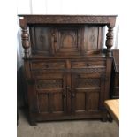 An oak Priory style court cupboard, 105 x 40 x 135 cm