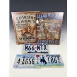 Western / Cowboy theme enamelled plaques together with three US vehicle registration plates