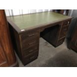 A vintage oak office desk with inset leather top, 121 x 68 x 73 cm