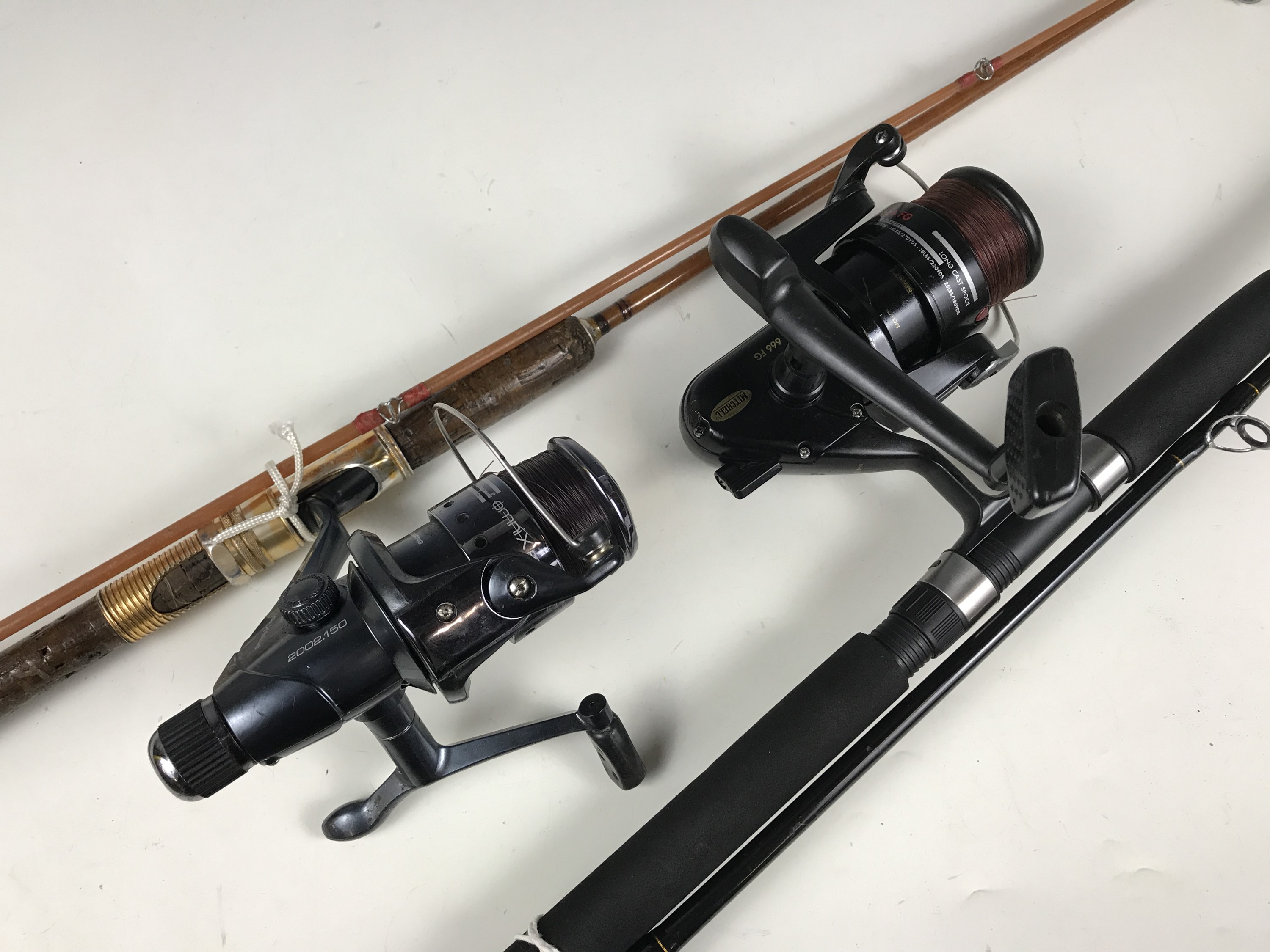 [Fishing] A Shakespeare Beta 9' spinning rod together with a Mitchell 666 F.G. spinning reel and one