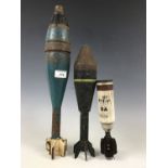 An inert 1960's 2-inch parachute flare mortar projectile, a dummy Energa rifle grenade and a drill