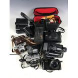 A quantity of vintage cameras including a Chinon CE-3, a Minolta Hi-Matic F, a Paxet Polavision land