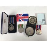 A National Service medal together with Second World War campaign medals and a compass