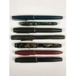 A quantity of fountain pens