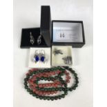 Costume jewellery including two necklaces and earrings