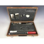 A vintage wooden cased inspection kit by P. Wallen & Co