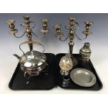 A pair of electroplate candelabra together with a spirit kettle and cocktail shaker etc