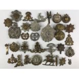 A quantity of Victorian and later British army cap badges