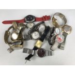 A quantity of vintage and modern men's wristwatches