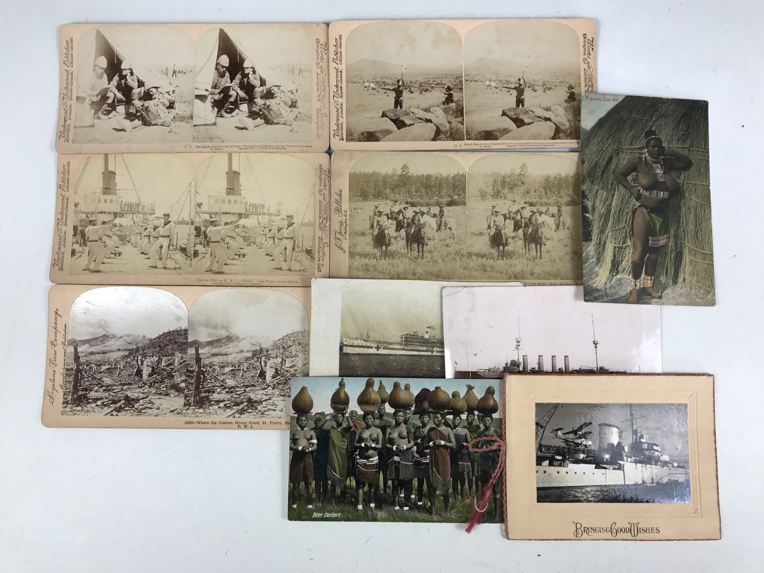 A small quantity of Boer War stereo views together with military and other postcards etc