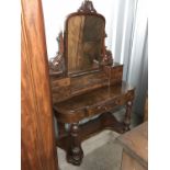A Victorian duchess burr walnut veneered dressing table, 120 cm wide