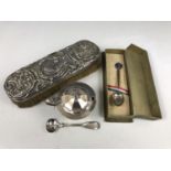A silver backed clothes brush together with a boxed 1935 silver commemorative spoon and silver