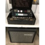 A Farfisa Transivox piano accordion together with a Farfisa TR70 - 0S combo amplifier