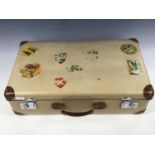 A vintage "Globe-Trotter" faux-velum suitcase