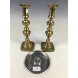 A pair of Victorian brass candlesticks together with a 1937 Edward VIII coronation commemorative
