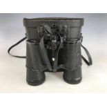A cased pair of Prinz 10x50 binoculars