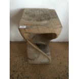 A contemporary sculptural wooden stool / stand, 51 cm high