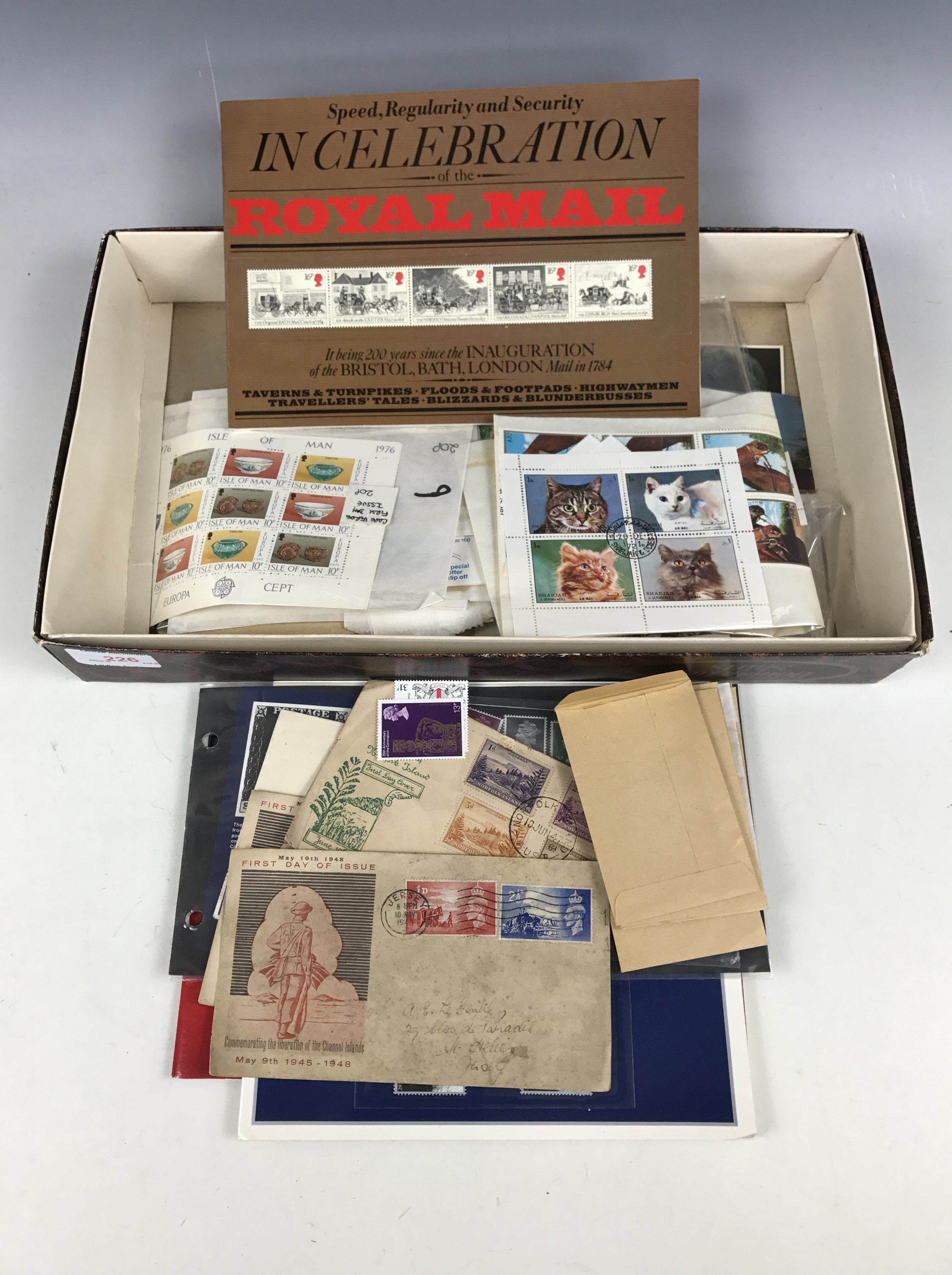 A small and varied quantity of stamps including a 1948 first day cover commemorating the