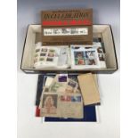 A small and varied quantity of stamps including a 1948 first day cover commemorating the