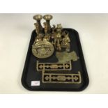 A quantity of vintage brass ware including two small kerbs, a brass knife rest and small