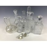 A quantity of Victorian and later cut-glass wine and spirit decanters