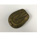 A Victorian brass pocket snuff box, the hinged lid modelled as a horses hoof / shoe