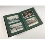 A late 19th / early 20th Century postcard album with contents