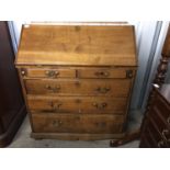 A George III oak fall-front bureau