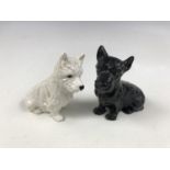 A pair of cast metal Scottie dogs