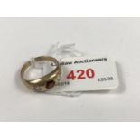 A 9ct gold ring gypsy-set with red and white stones, 3.4 g