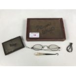 Sundry collectors' items, including 19th Century spectacles and a faceted steel glove hook etc