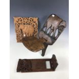 A carved elephant stool together with a book slide and wall plaque